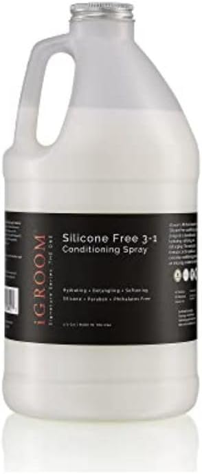 Applying iGroom Dog Detangler Spray on a dog's coat
